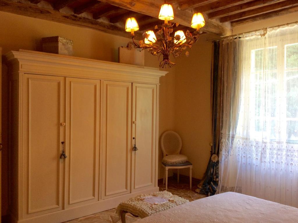 Posteľ alebo postele v izbe v ubytovaní La casa del cuore