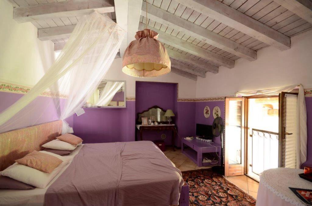 Postel nebo postele na pokoji v ubytování B&B Cosi fan Tutte