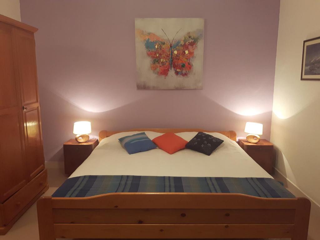 Łóżko lub łóżka w pokoju w obiekcie Apartment Stiniva