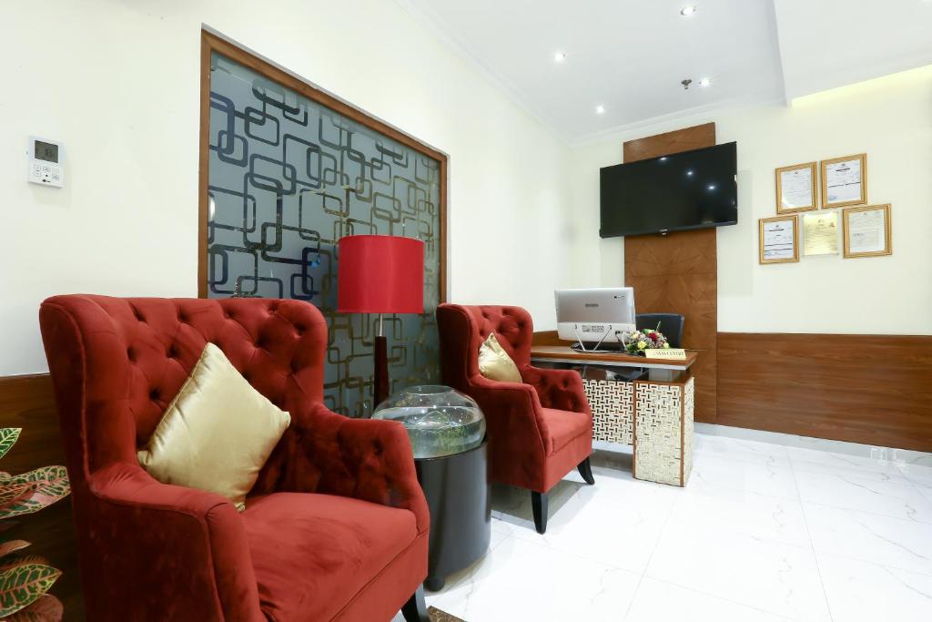 Posezení v ubytování La Villa Suites Hotel