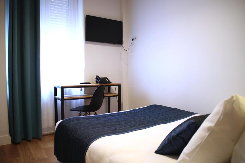 TV a/nebo společenská místnost v ubytování Hotel Saint Vincent