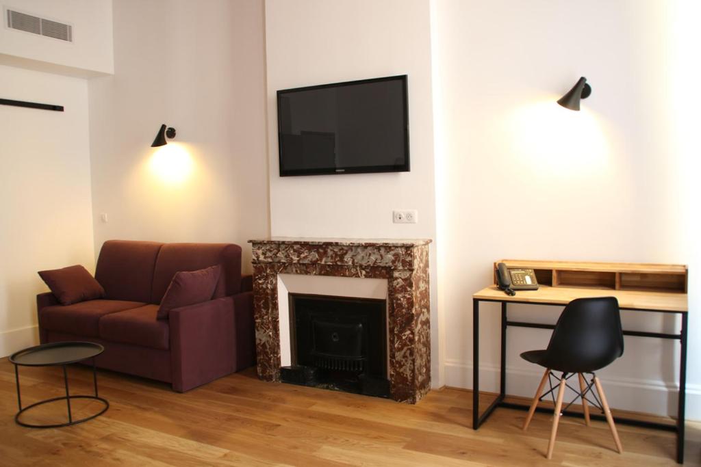 TV a/nebo společenská místnost v ubytování Hotel Saint Vincent