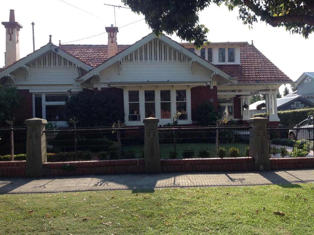 a house with a fence in front of it at Bindaree in Geelong