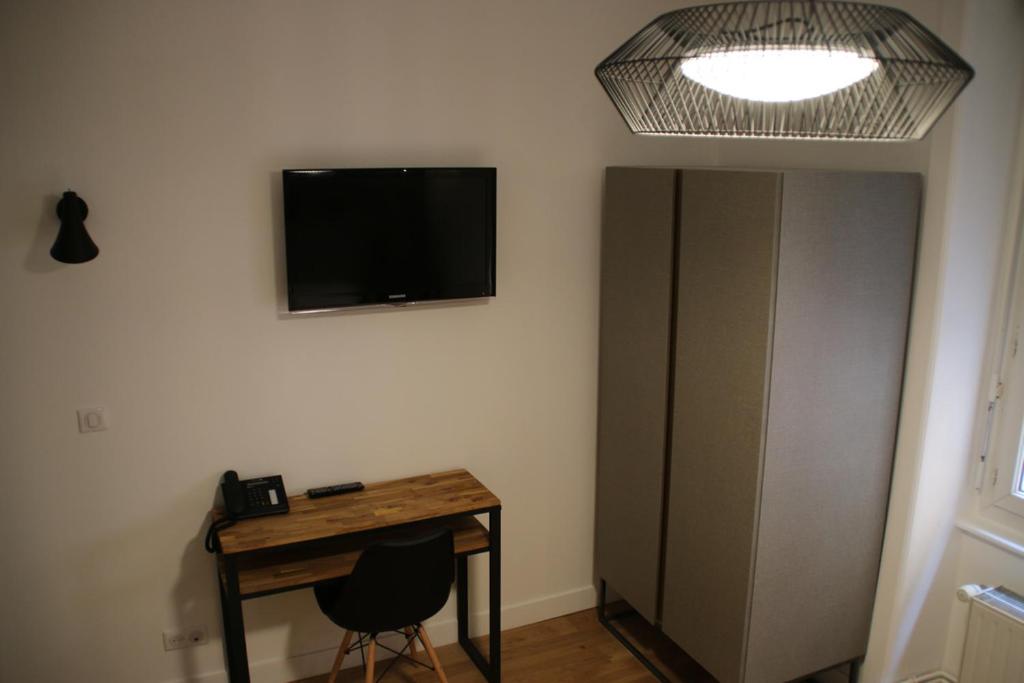 TV a/nebo společenská místnost v ubytování Hotel Saint Vincent