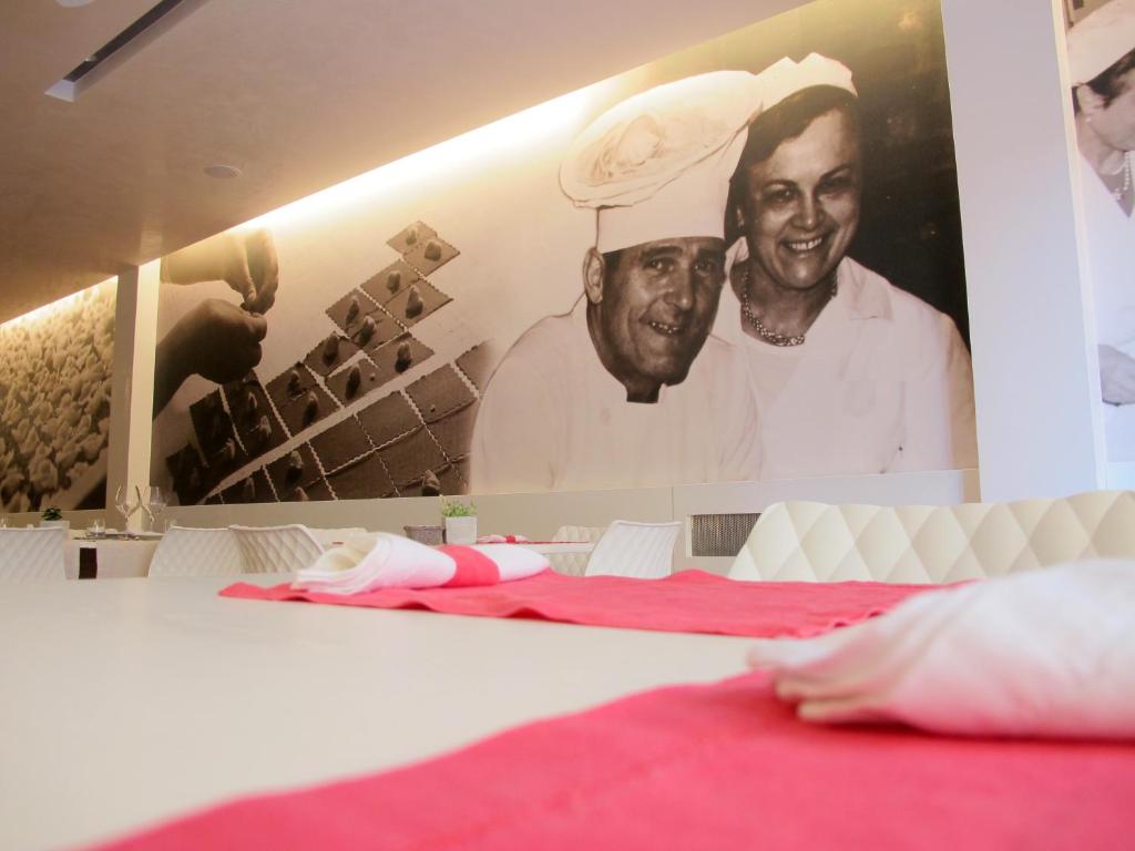 Postel nebo postele na pokoji v ubytování Albergo Al Cacciatore Tortellinando