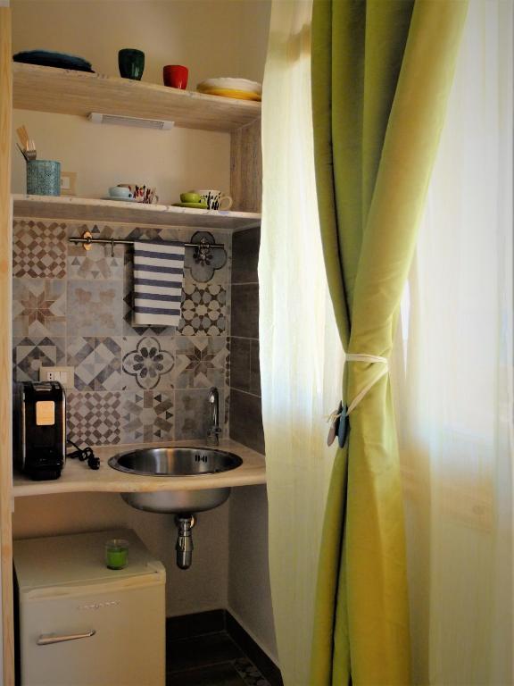 A kitchen or kitchenette at Incanto delle Ninfe