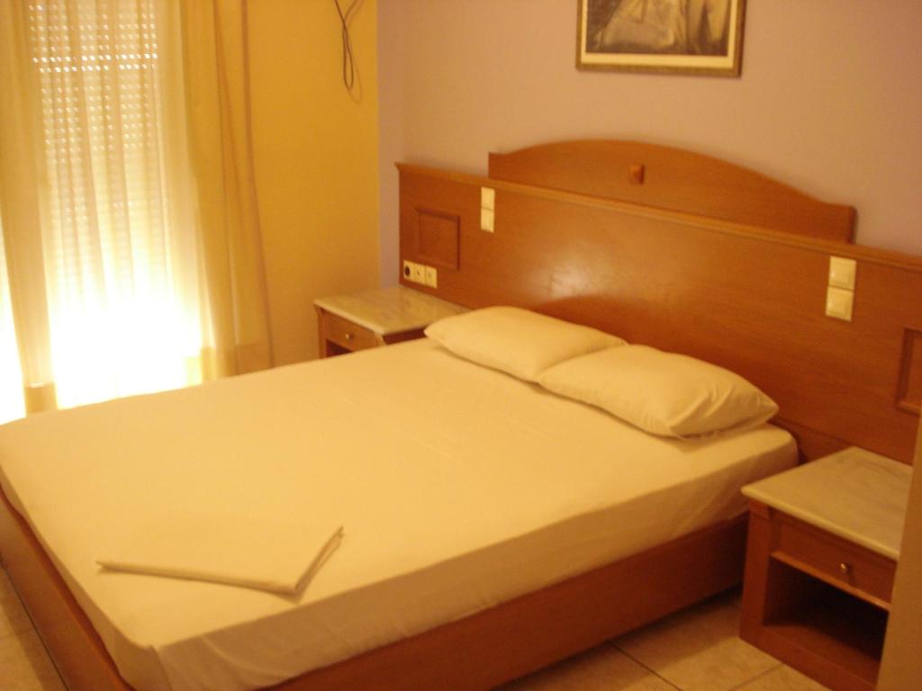 Posteľ alebo postele v izbe v ubytovaní Hotel Cybele Pefki