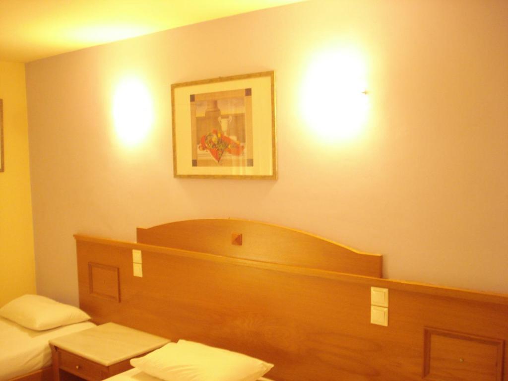 Posteľ alebo postele v izbe v ubytovaní Hotel Cybele Pefki