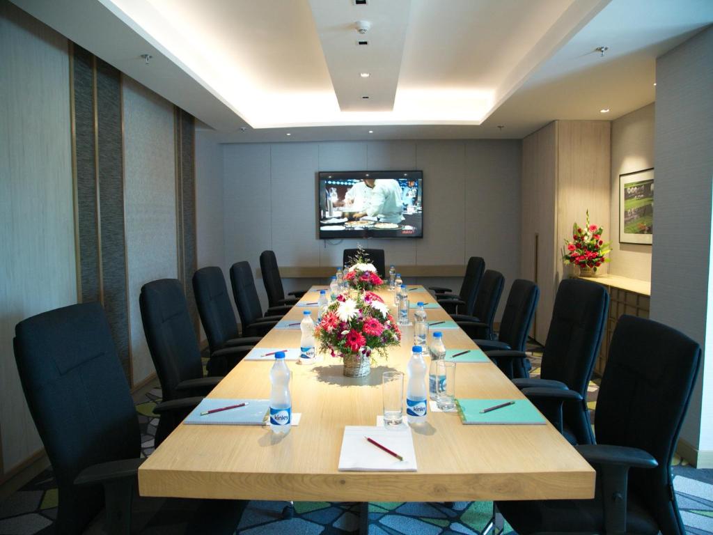 TV a/nebo společenská místnost v ubytování Welcomhotel by ITC Hotels, RaceCourse, Coimbatore