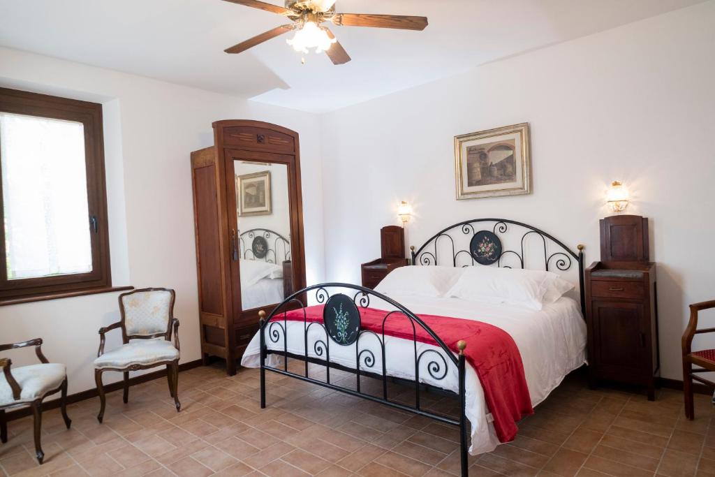 Postel nebo postele na pokoji v ubytování I Rondoni B&B