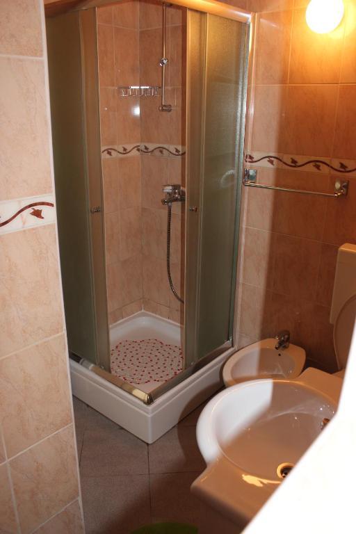 Koupelna v ubytování Guest House Dada