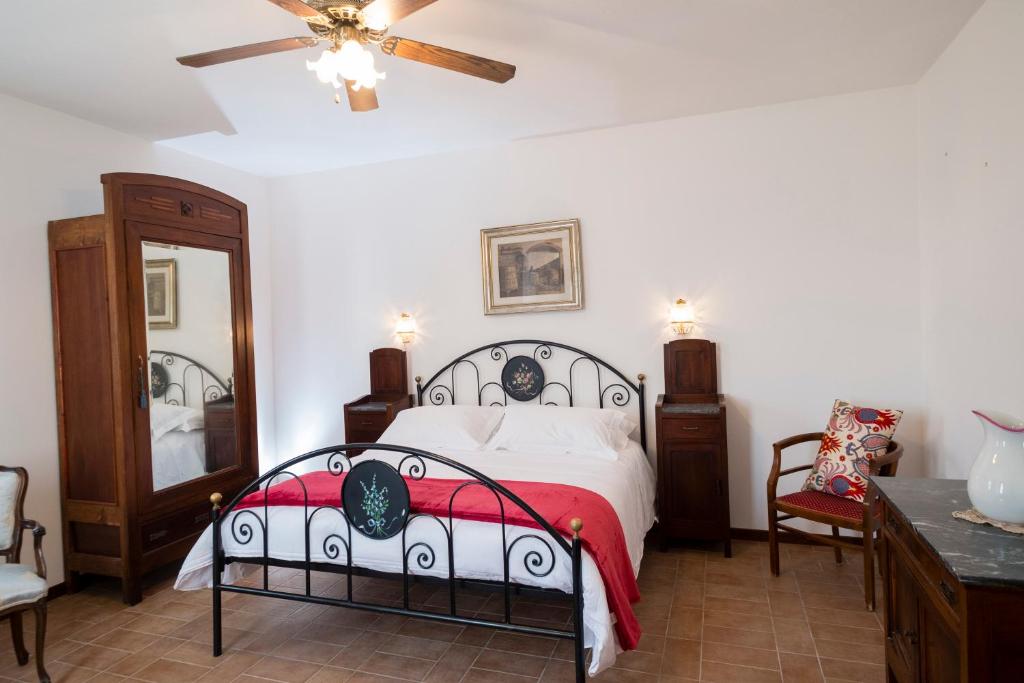 Postel nebo postele na pokoji v ubytování I Rondoni B&B