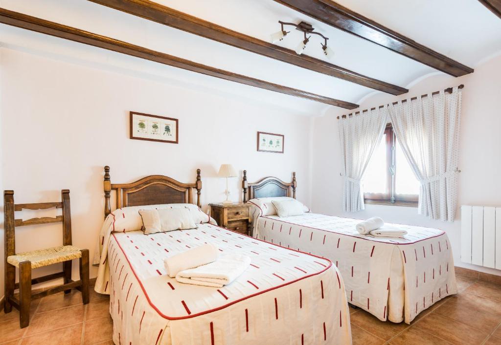 Postel nebo postele na pokoji v ubytování Casa La Carpintera