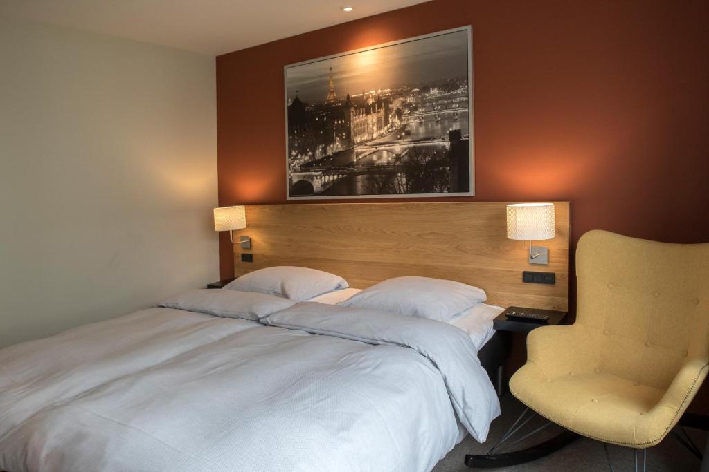 Postel nebo postele na pokoji v ubytování Hotel 6400