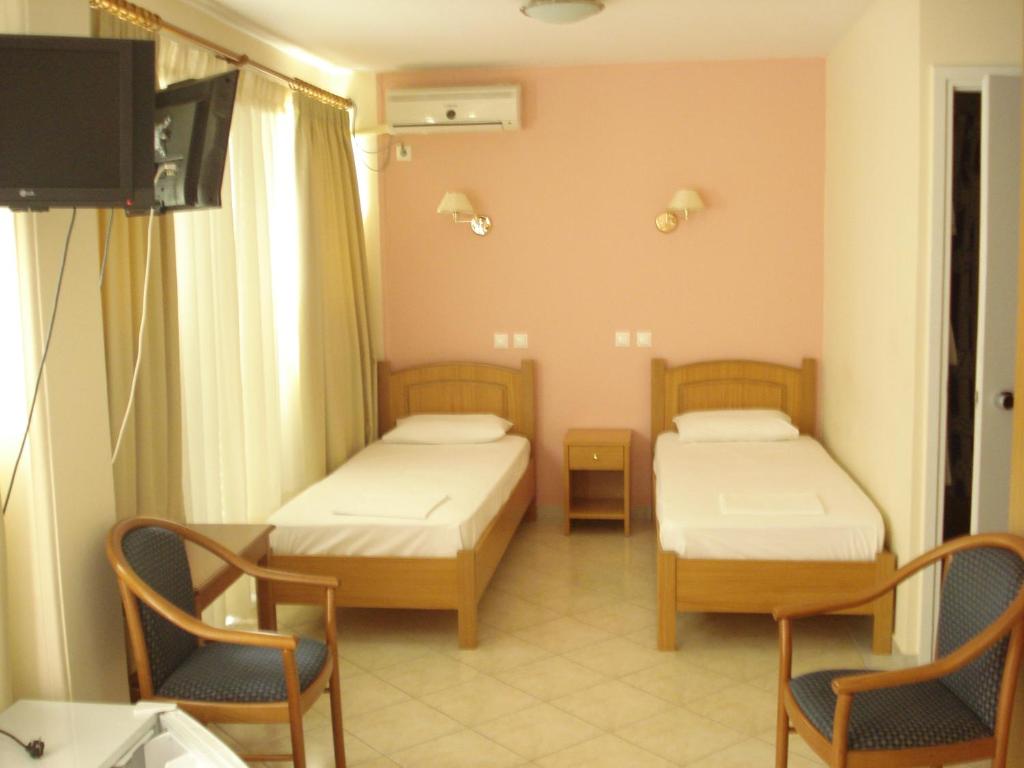 Posteľ alebo postele v izbe v ubytovaní Cybele Guest Accommodation