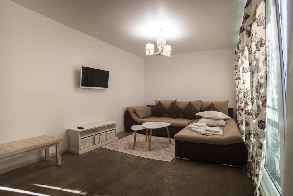 TV a/nebo společenská místnost v ubytování Oneiro Resort