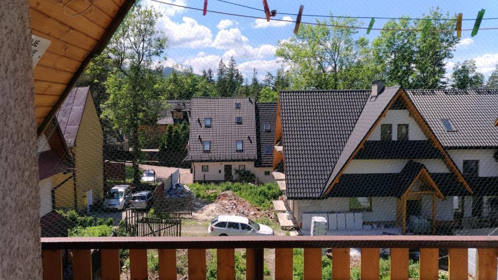 a view of a residential neighborhood with houses at Apartament Droga na Bystre 9a in Zakopane