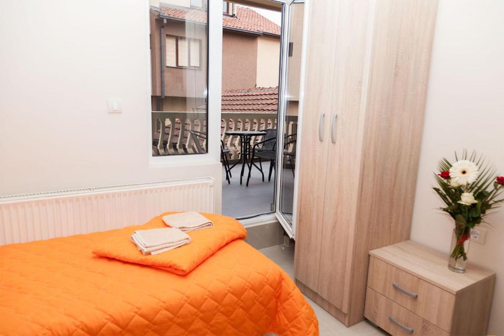 Postel nebo postele na pokoji v ubytování Prenoćište Kovač