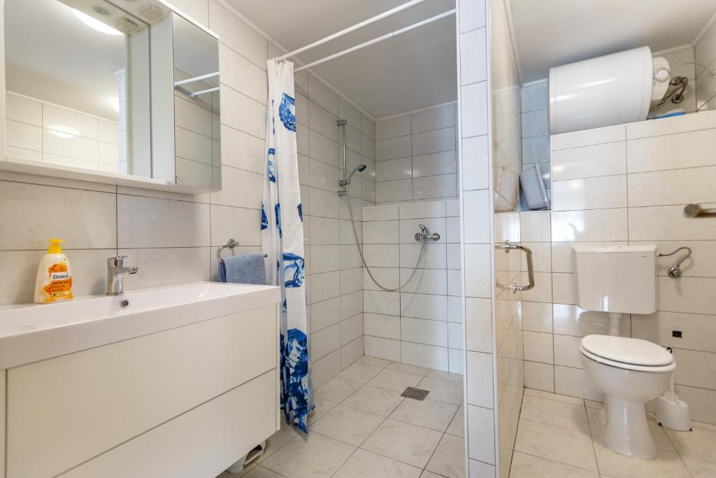 Koupelna v ubytování Apartmani M