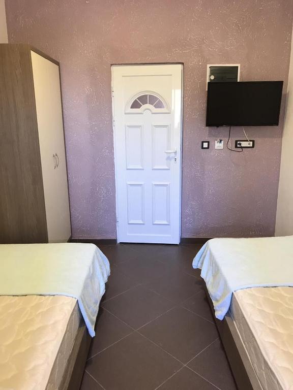 TV a/nebo společenská místnost v ubytování Vip Apartmani Canj
