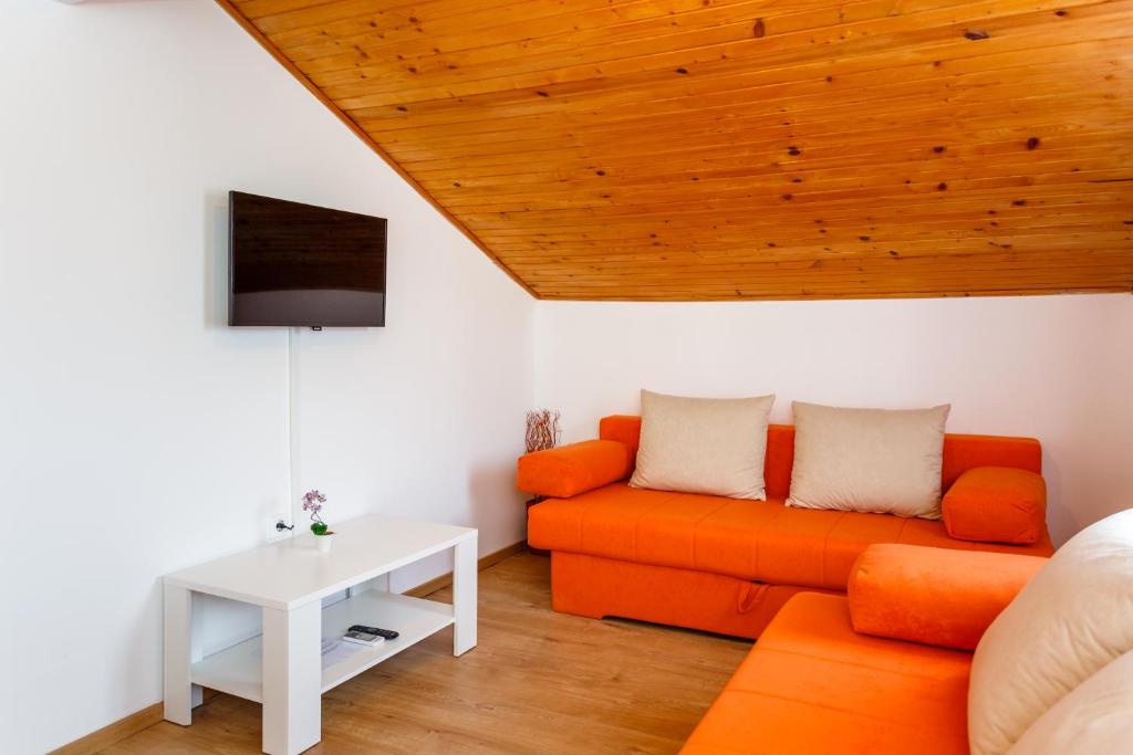 TV a/nebo společenská místnost v ubytování Apartmani M