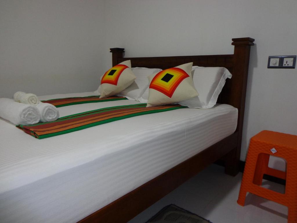 Postel nebo postele na pokoji v ubytování Rajarata Reach Resort