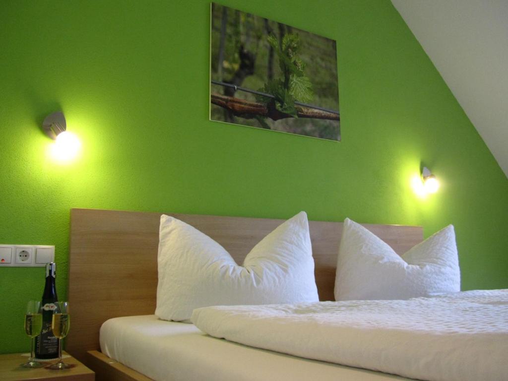 Postel nebo postele na pokoji v ubytování Weingut Karl Braun