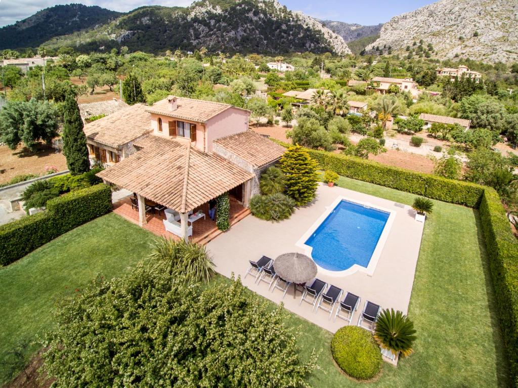 an aerial view of a house with a swimming pool at Villa Rostoya in Pollença