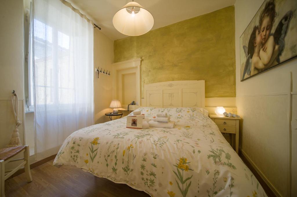 Postel nebo postele na pokoji v ubytování Albergo Etruria