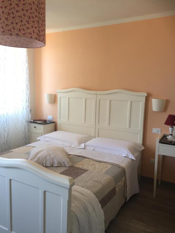 Postel nebo postele na pokoji v ubytování La Linea D'Acqua