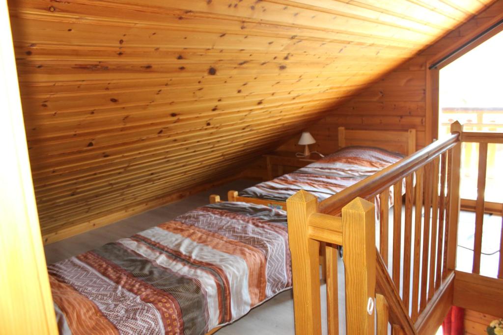 Postel nebo postele na pokoji v ubytování chalets de la Soyotte