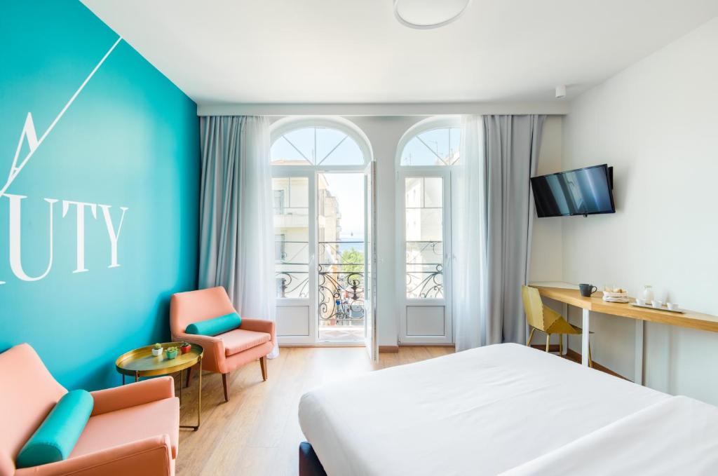 Postel nebo postele na pokoji v ubytování Colors Urban Hotel Thessaloniki