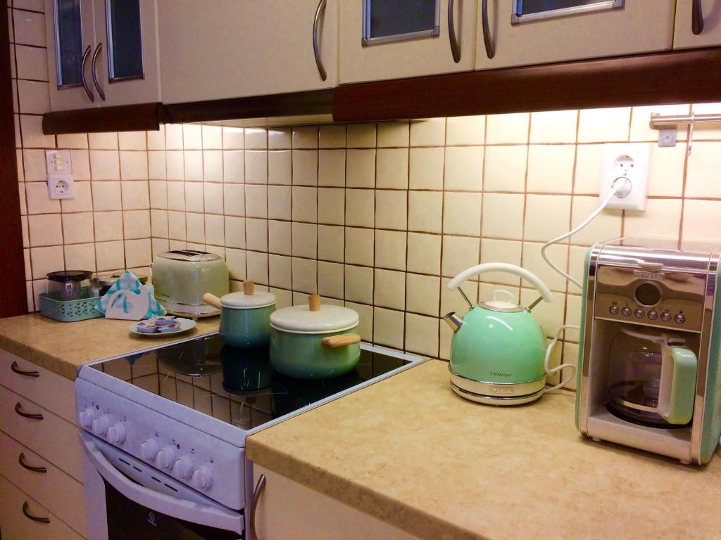 Kuchyňa alebo kuchynka v ubytovaní Star Parthenon Apartment