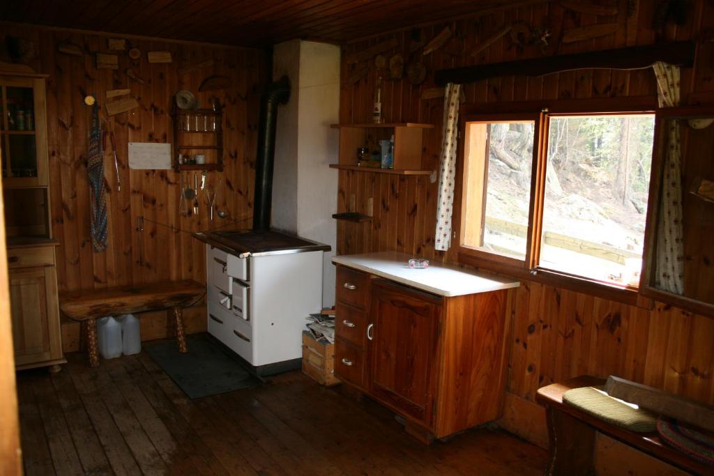 Kuchyň nebo kuchyňský kout v ubytování Gästehaus Berger - Priglhof