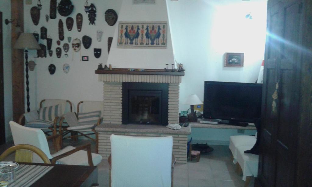TV a/nebo společenská místnost v ubytování B&B S'Archiotta