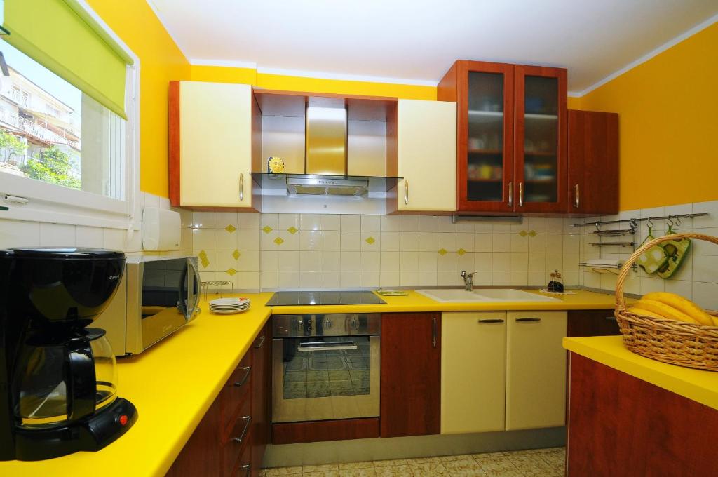 Kuchyňa alebo kuchynka v ubytovaní Apartman Norma free parking