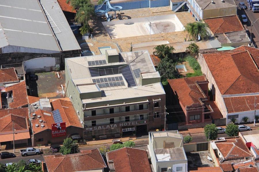 an overhead view of a city with buildings at SALATA Hotel CENTRO in Jardinópolis