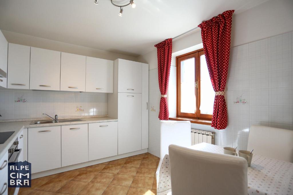 Kuchyň nebo kuchyňský kout v ubytování Chalet Laila