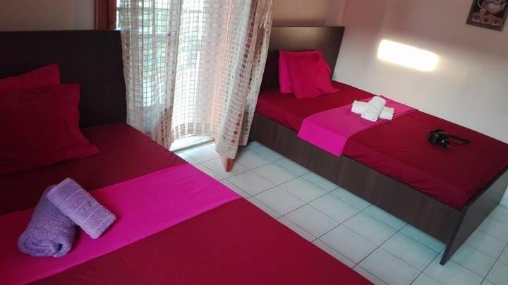 Posteľ alebo postele v izbe v ubytovaní Eleni Antonouli Rooms