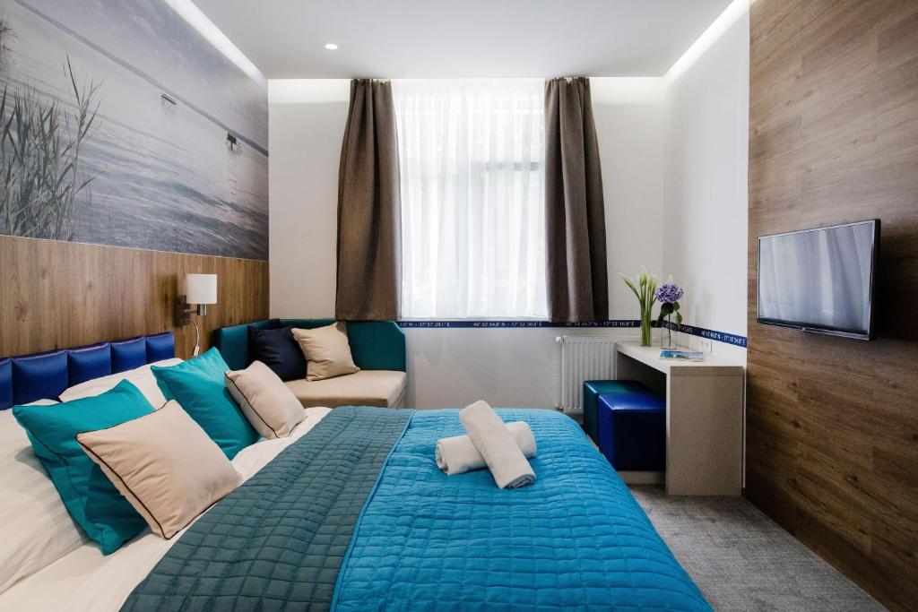 Postel nebo postele na pokoji v ubytování Hotel Solero