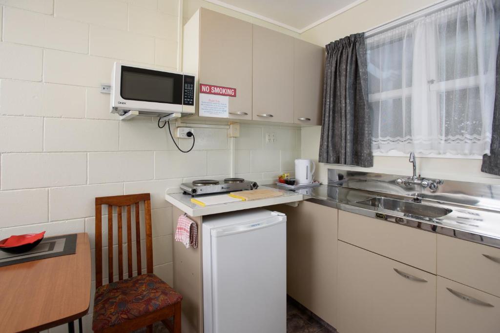 Kuchyň nebo kuchyňský kout v ubytování Kauri Lodge Motel