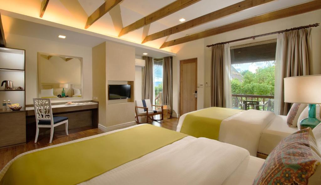 TV a/nebo společenská místnost v ubytování Mithi Resort & Spa