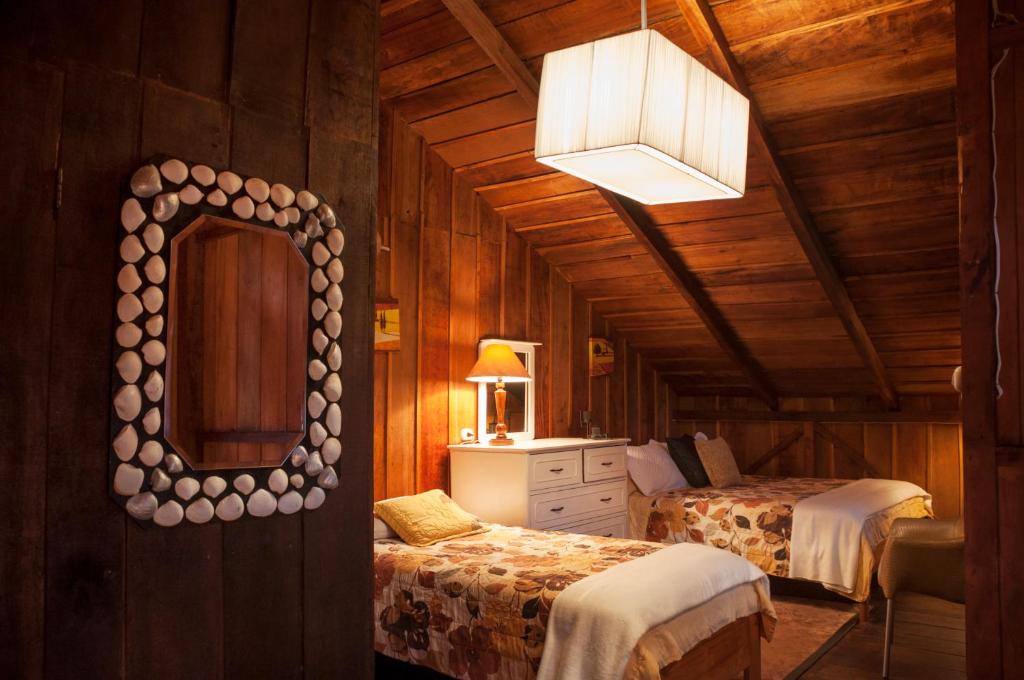 Postel nebo postele na pokoji v ubytování Casa de Piedra