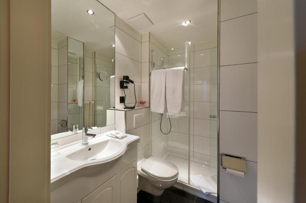 Koupelna v ubytování Apart Hotel Amadeo