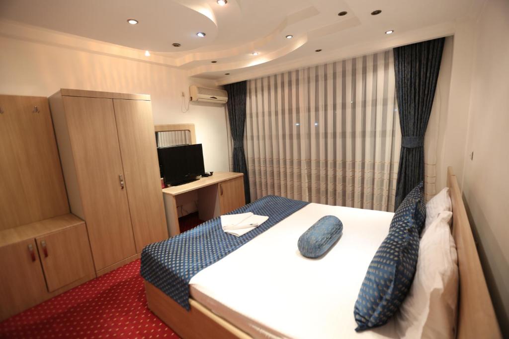 Postel nebo postele na pokoji v ubytování Hotel Pejton