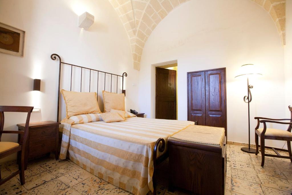 Postel nebo postele na pokoji v ubytování Masseria Bosco & Masseria Strazzati