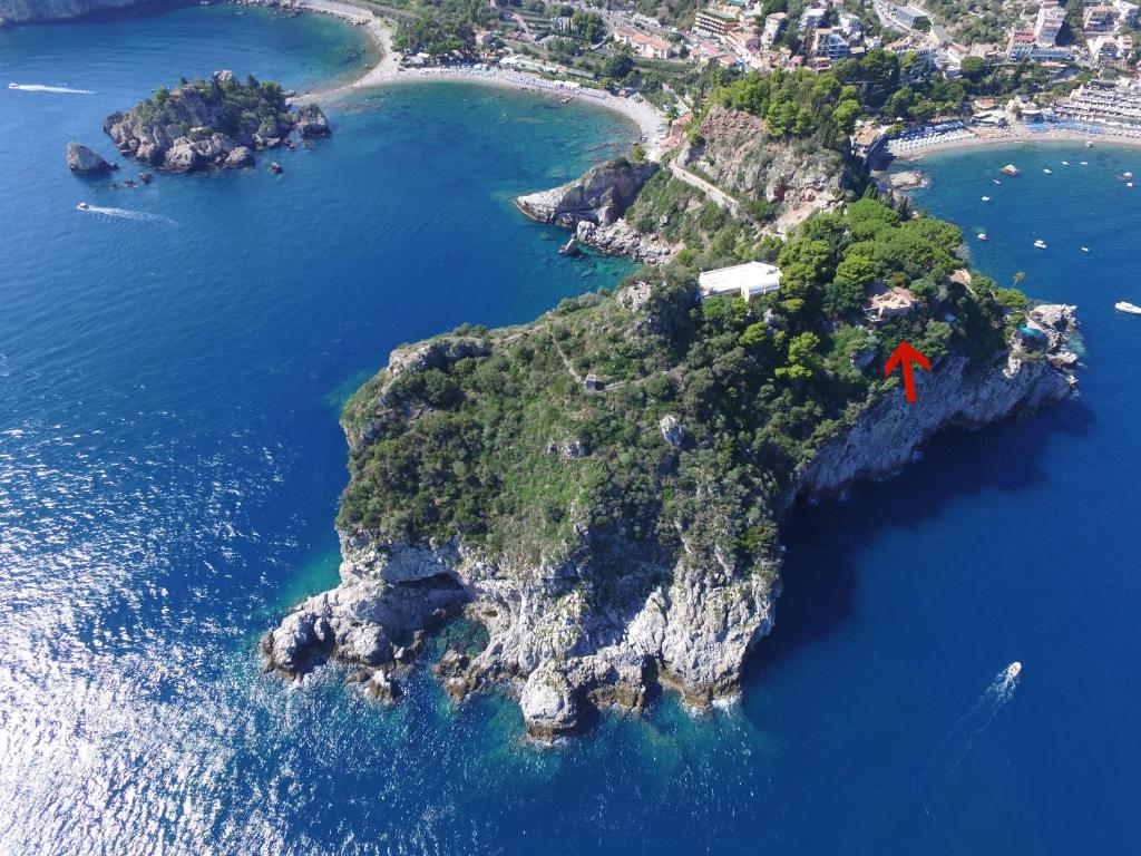 an aerial view of an island in the ocean at Villa Mariedda in Taormina
