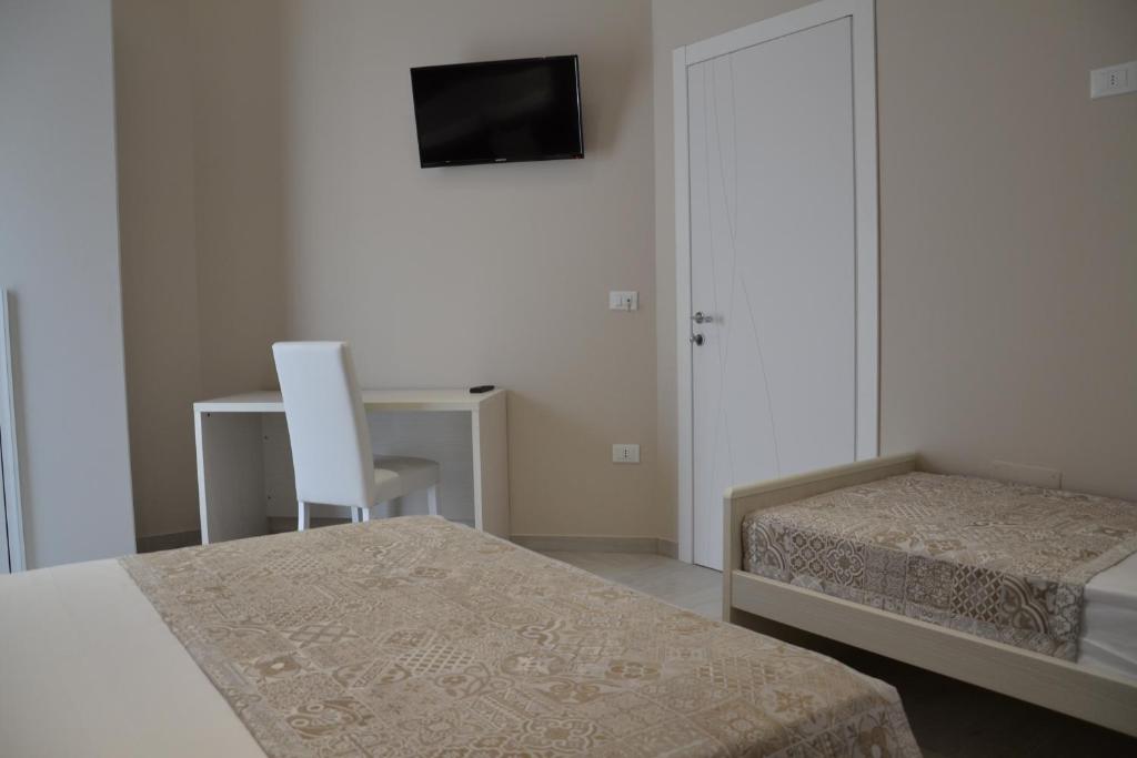 Postel nebo postele na pokoji v ubytování B&B Terra d'Oriente