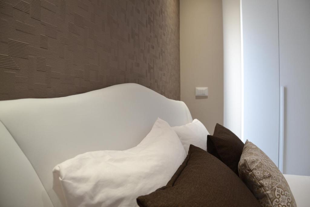 Postel nebo postele na pokoji v ubytování B&B Terra d'Oriente