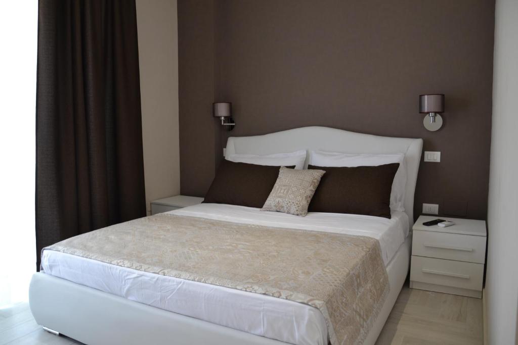 Postel nebo postele na pokoji v ubytování B&B Terra d'Oriente